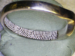 Ring with internal fingerprint