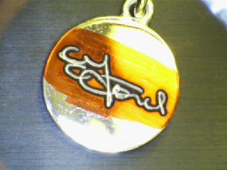 Pendant with signature